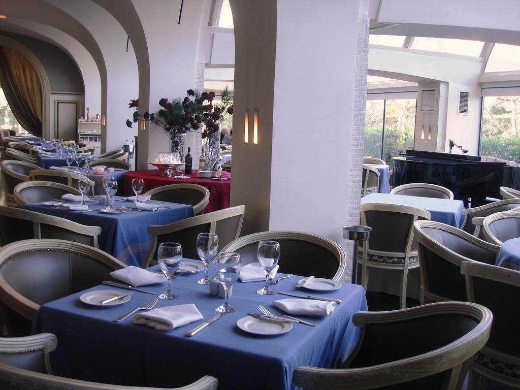 Pentelikon Hotel Кифисья Ресторан фото